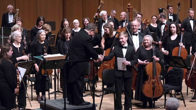 Applause for William Lewis, May's boy soloist